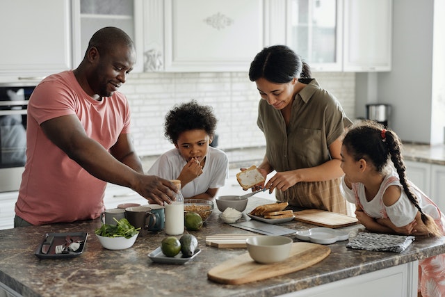 family at home in kitchen